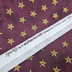 Stof - Sparkle Gold and Plum Star 100% Cotton Fabric