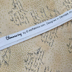 Stof - Glimmering Text Neutral 100% Cotton Fabric