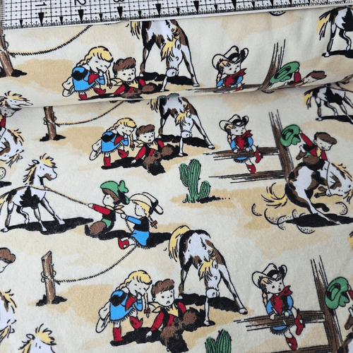 Camelot Cottons - Cowboys Cream 21179909B Brushed 100% Cotton Fabric - Crafts and Quilts