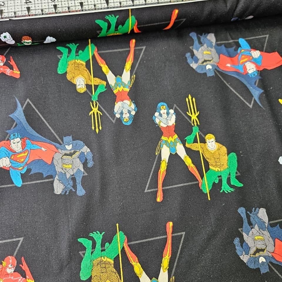 Camelot Cottons - DC Justice League Superheroes Pose Black 23421205 100% Cotton Fabric