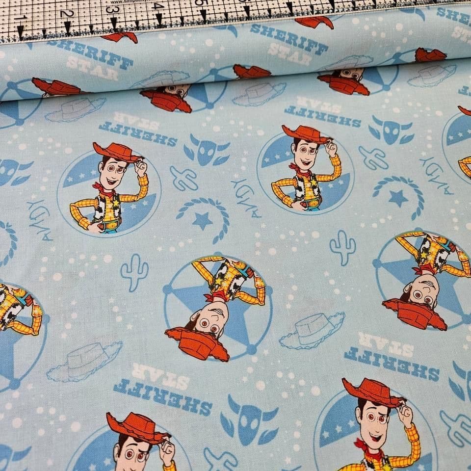 Camelot Cottons - Disney Toy Story Woody Blue 85410103 100% Cotton Fabric