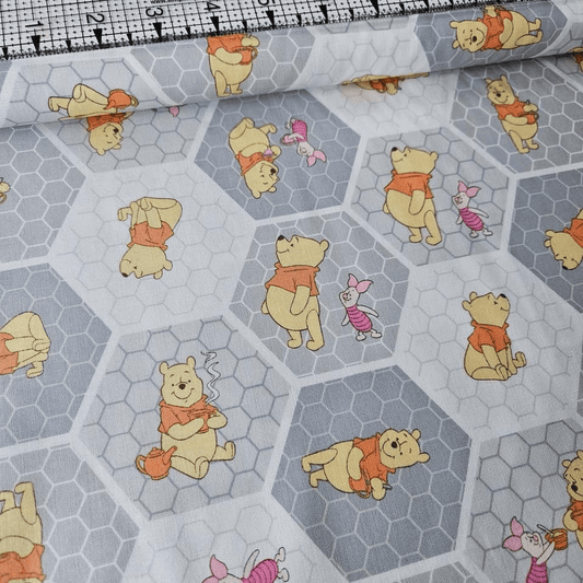 Camelot Cottons - Winnie the Pooh Honeycomb Grey 85430102 100% Cotton Fabric