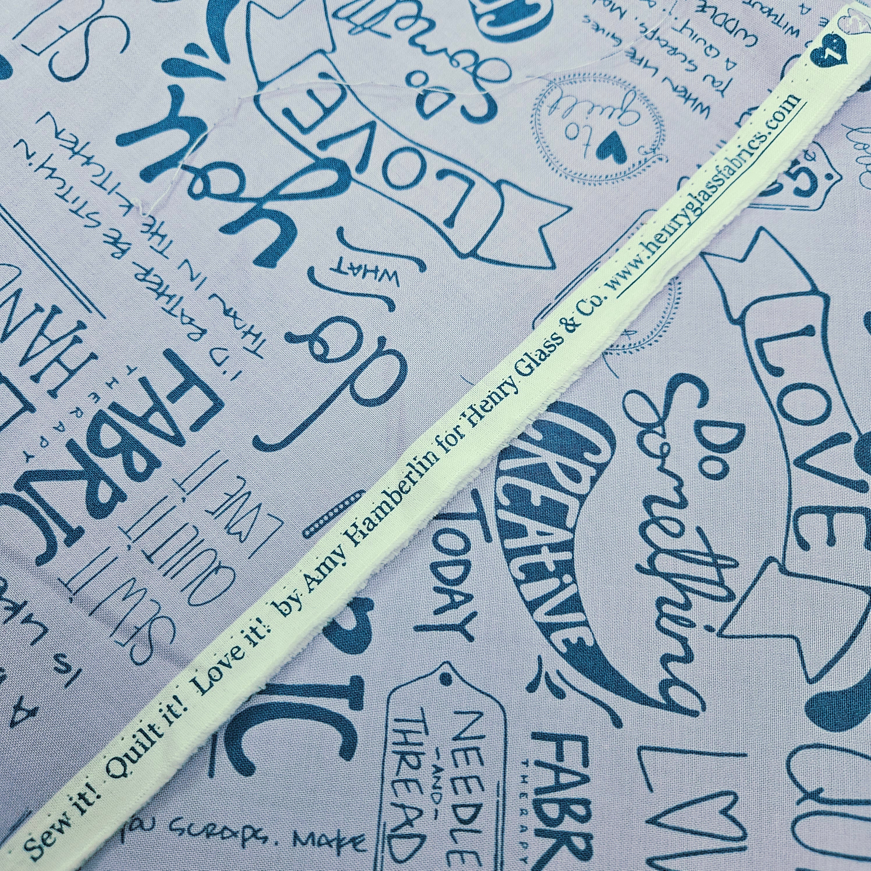 Henry Glass - Sew it! Quilt it! Love it! Quotes Purple 100% Cotton Fabric - Crafts and Quilts