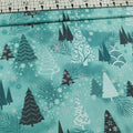 Stof - Its Snowflake Trees Teal Metallic 100% Cotton Fabric